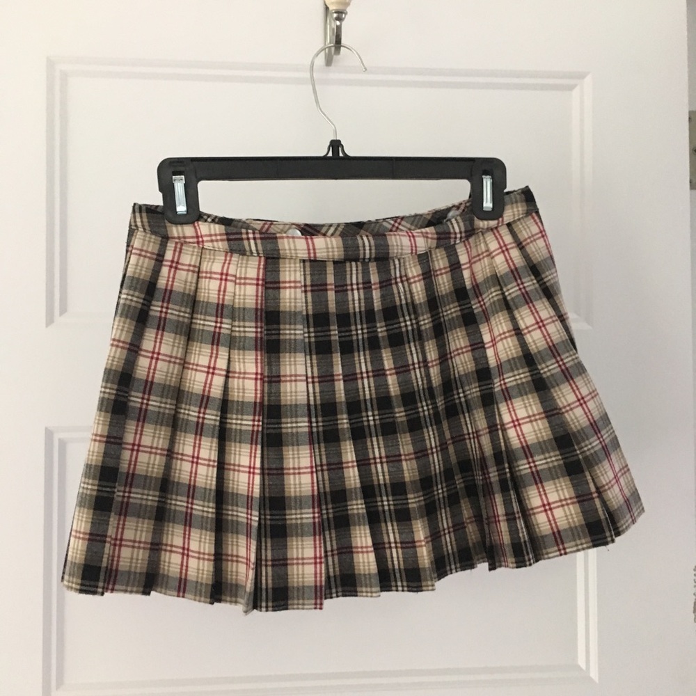 Plaid Pleated Mini Skirt with silver buckles.